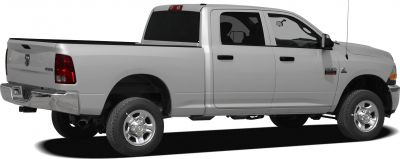 Side view of extended cab pickup with long bed and chrome wheels