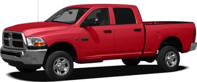 Red heavy-duty pickup truck side view with dual rear doors and prominent grille
