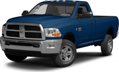 Blue single cab pickup truck with chrome grille and rugged tires