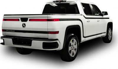 Rear view of a pickup truck with LED tail lights and a modern tailgate design