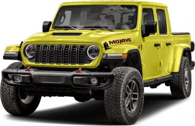 Front view of rugged pickup with aggressive grille and off-road tires