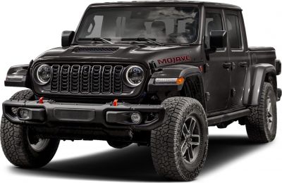 Front view of rugged pickup with distinctive grille and off-road tires