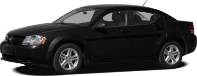 Side profile of black mid-size sedan with alloy wheels