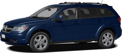 Mid-size SUV side profile with roof rack and alloy wheels