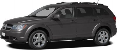 Side profile of a mid-size SUV with roof rails and alloy wheels