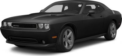 Black muscle car with aggressive front grille and dual round headlights