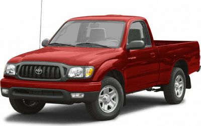 Red single cab pickup truck with black grille and silver wheels