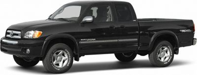 Black pickup truck with extended cab and off-road tires