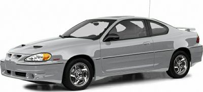 Front side view of a 2-door coupe with chrome wheels