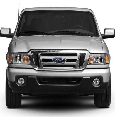Front grille and headlights of a pickup truck at close range.