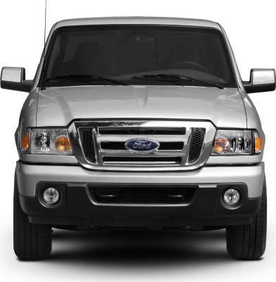 Pickup truck front with chrome grille and dual headlight units