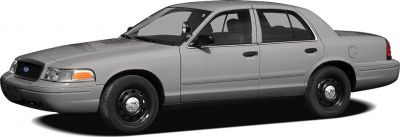 Side profile of a sedan with police spotlight and steel wheels