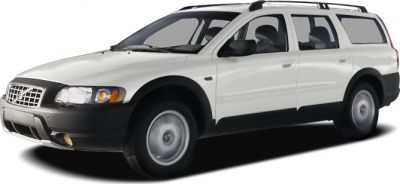 Front side view of white station wagon with roof rails and rugged black cladding