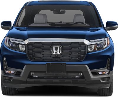 Bold front grille and sleek LED headlights of a modern SUV.