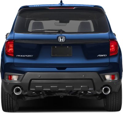 SUV rear view with dual exhaust, AWD badge, modern taillights, and rear windshield wiper