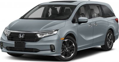 Front side view of minivan with LED headlights and chrome grille