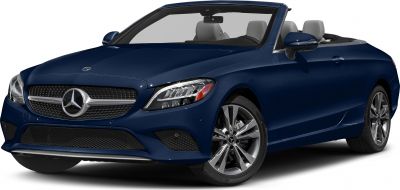 Front side view of a blue convertible with alloy wheels and open roof