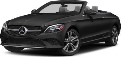 Front-side view of a black convertible with LED headlights and alloy wheels.