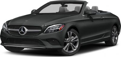 Convertible front with prominent grille, headlights, and alloy wheels