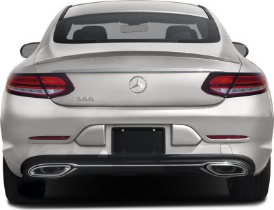 Rear view with streamlined taillights and dual exhaust outlets