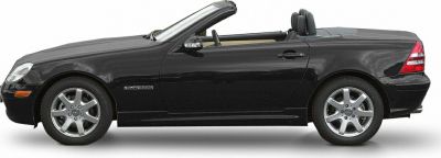 Side view of a convertible coupe with Kompressor badge and alloy wheels