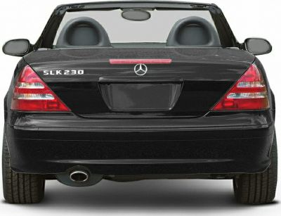 Rear view of a black convertible with taillights and single exhaust