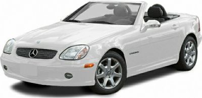 Front side view of a white convertible with sporty alloy wheels.