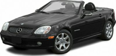 Front view of convertible with prominent headlights and alloy wheels
