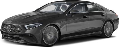 Sport coupe with distinctive front grille and spinning wheels in motion