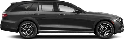 Black station wagon side view with alloy wheels and roof rails