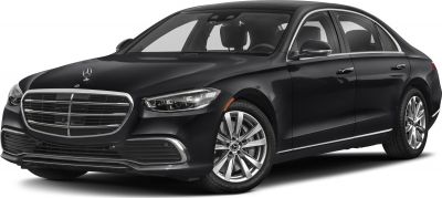 Front three-quarter view of a luxury sedan with chrome grille and sleek headlights