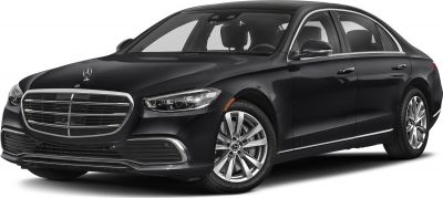 Front grille and sleek headlights of luxury long sedan
