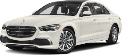 Front view of luxury sedan with LED headlights and large grille