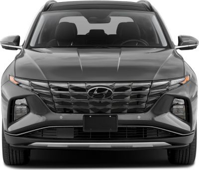 Front view with distinctive grille and headlight design