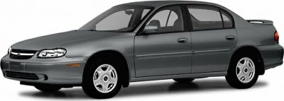 Side profile of a sedan with smooth body lines and alloy wheels