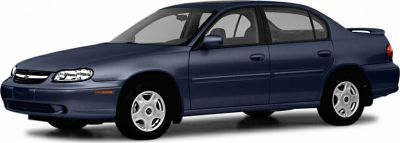 Blue four-door sedan side view with alloy wheels