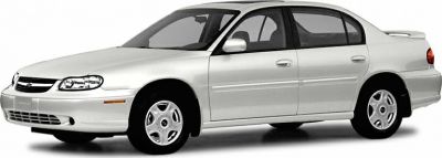 Front side view of a four-door sedan with smooth curves and distinct headlights