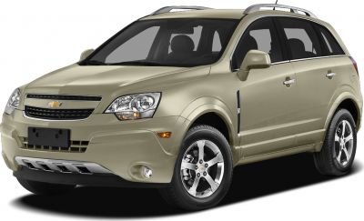 Front side view of SUV with alloy wheels and roof rails