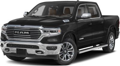 Chrome grille and alloy wheels on a black pickup truck.