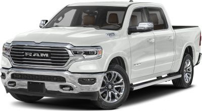Chrome grille and alloy wheels on pickup truck front-side view