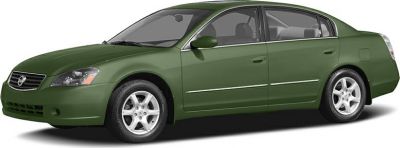 Green sedan with front side angle, alloy wheels, and sleek design