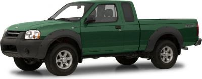 Extended cab pickup truck with black fender flares and alloy wheels