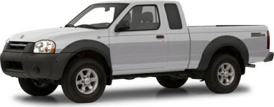 Side view of extended cab pickup with black trim and alloy wheels