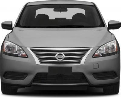 Front view with chrome grille and clear headlights