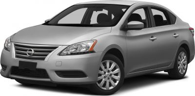 Front-side view of a silver compact sedan with distinctive grille and headlights