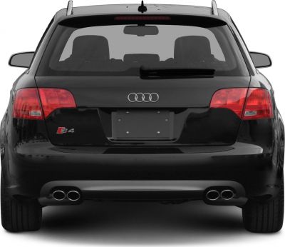 Black rear view of a station wagon with quad exhaust tips and large taillights.