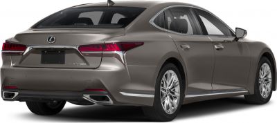 Rear view with sleek tail lights and dual exhaust of luxury sedan