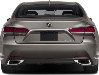 Rear view with distinctive tail lights and dual exhaust outlets