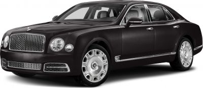 Front side view of luxury sedan with prominent grille and round headlights