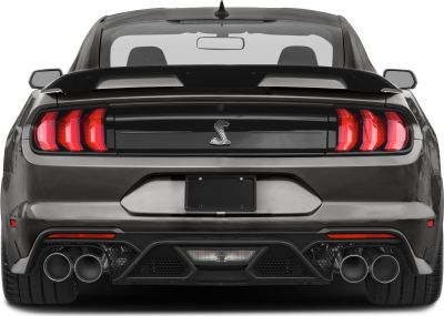 Rear view with quad exhaust pipes and distinct triple bar tail lights